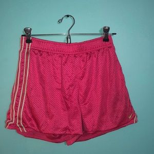Pink Nike running shorts